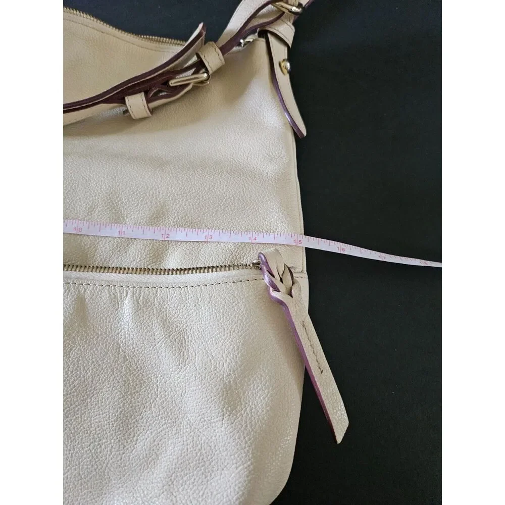 Dooney & Bourke tan leather hobo bag